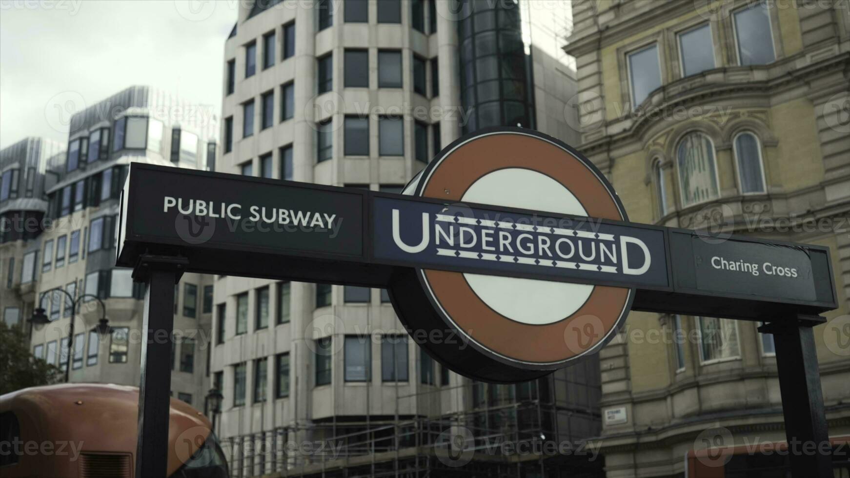 Close-up of the modern logo of the London Transport Underground Railway at the Trafalgar Square to Charing Cross. Action. Famous England landmarks photo