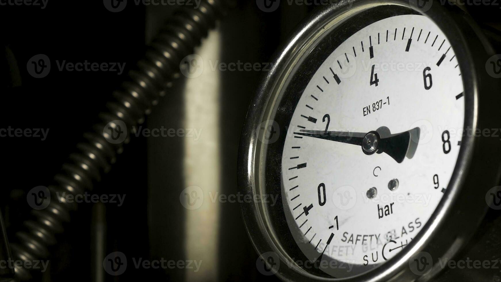 Old Vintage barometer with based. Manometer precise instrument in laboratory, close up. Industrial barometer, close up view, vintage film look. photo