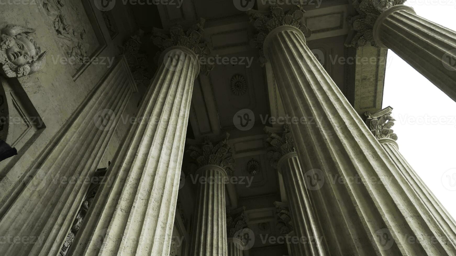 Corinthian columns of Kazan Cathedral, Saint-Petersburg, Russia. Action. Bottom view of the beautiful colonnade of Russian Orthodox Church, concept of architecture. photo