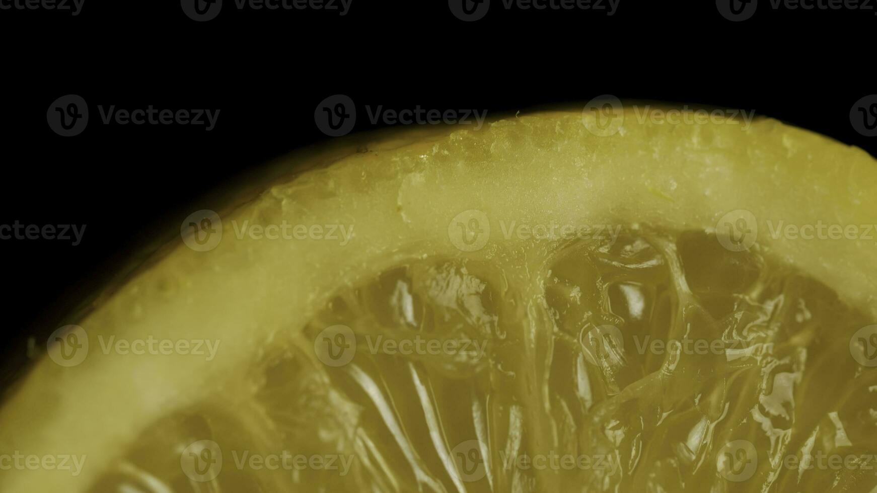 Lemon sectional on black background. Half lemon on a black background. lemon slice on black isolated photo