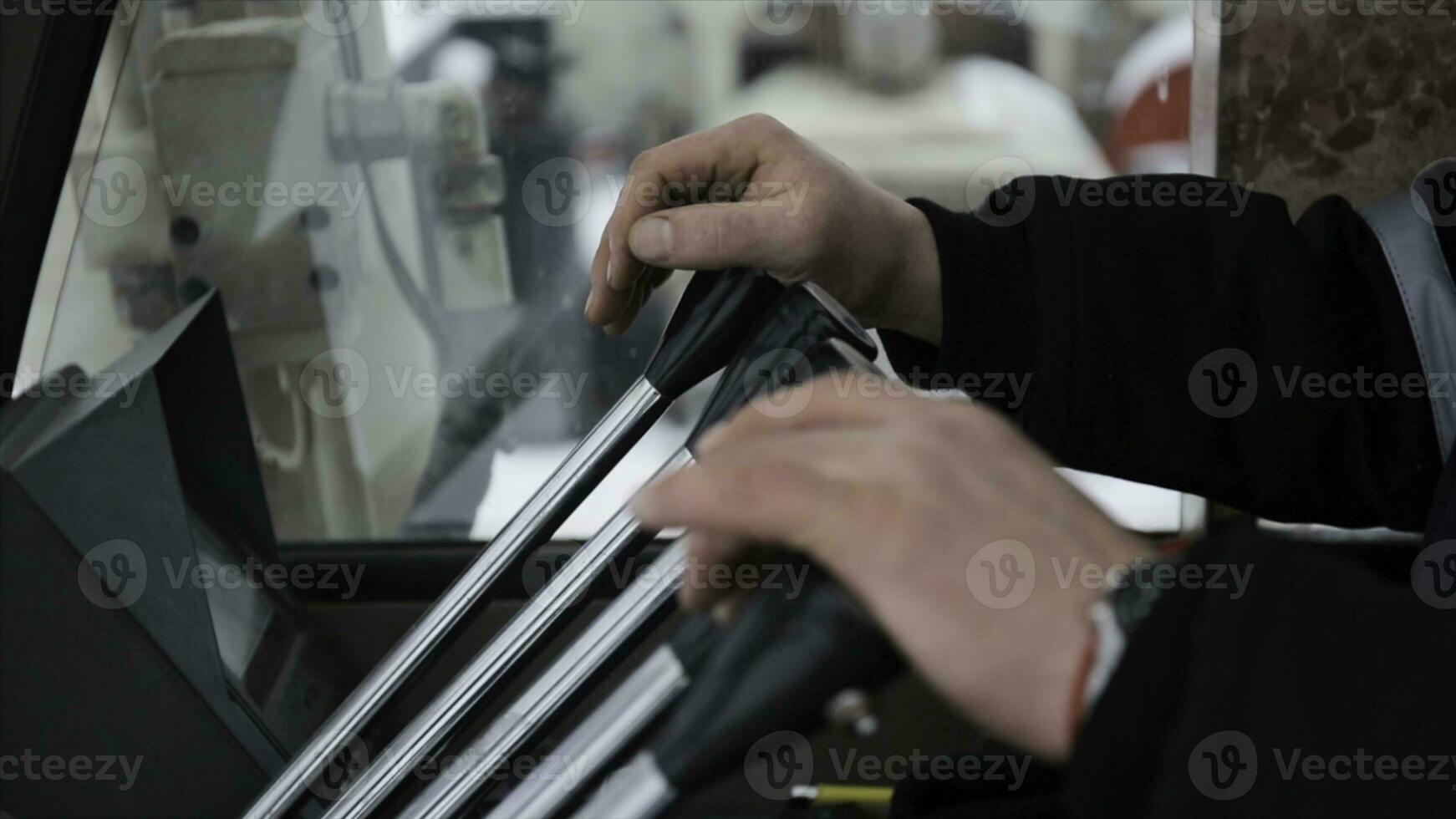 Crane Operator. A worker hand with Lorry Crane control. Old crane truck hydraulic control. photo