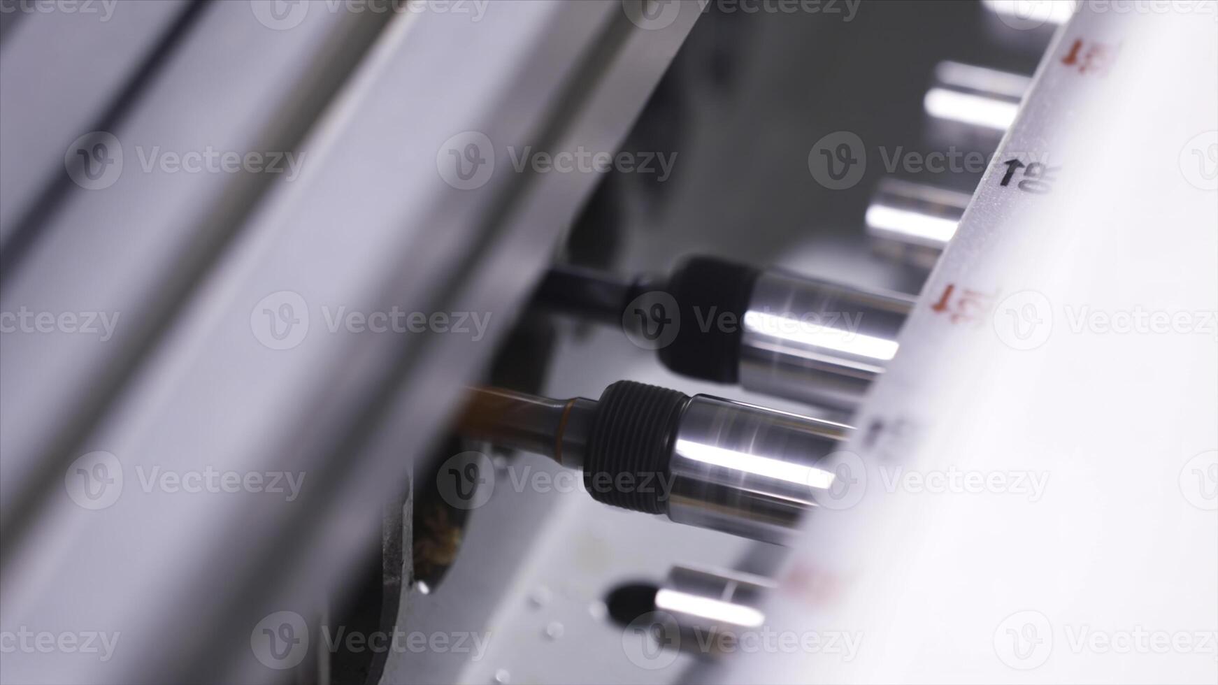 Close-up of working automatically wood drilling machine at the furniture factory. Action. Production, manufacture and woodworking industry concept photo