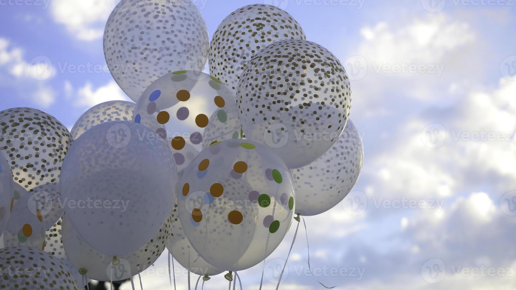 White balloons against the sky. White balls in the sky photo