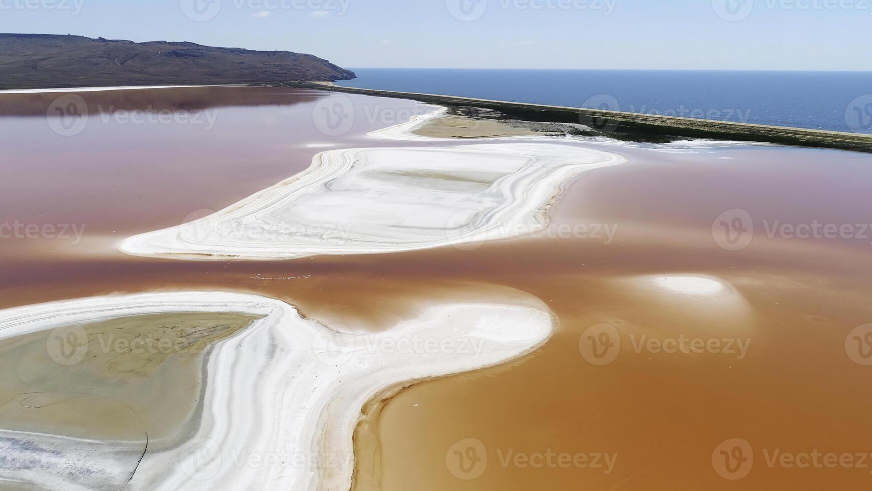 Beautiful aerial view of Laguna Colorada or Red Lake, a shallow salt lake in the southwest of the Altiplano of Bolivia. Shot. Eduardo Avaroa andean fauna National Reserve photo