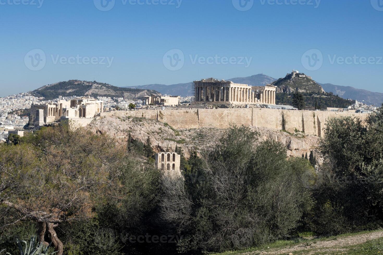 View of the Acropolis, Parthenon and Lycabettus Hill from Philopappos Hill in Athens, Greece photo