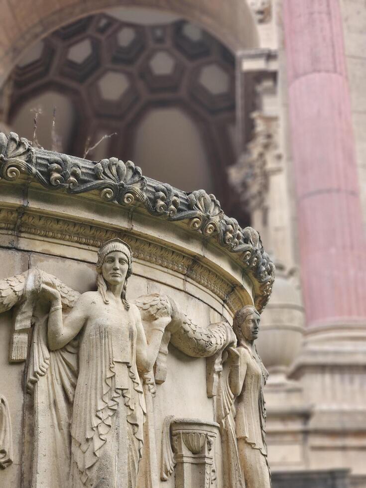 Female sculptures and statues in the architecture of Palace of Fine Arts in San Francisco California photo