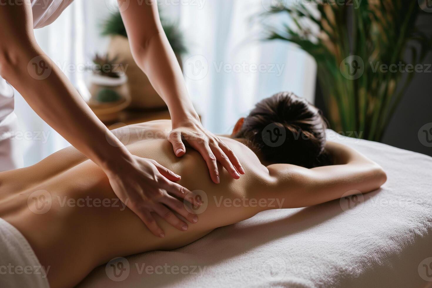 AI generated Young woman receiving back massage in spa salon. Beauty treatment concept. photo