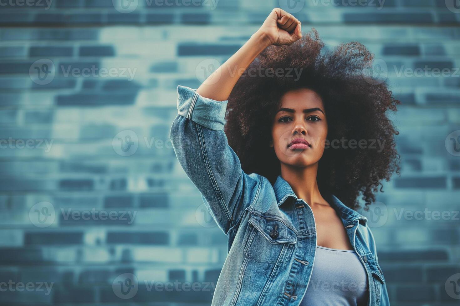 AI generated portrait of afro american woman with raised fist, girl power photo