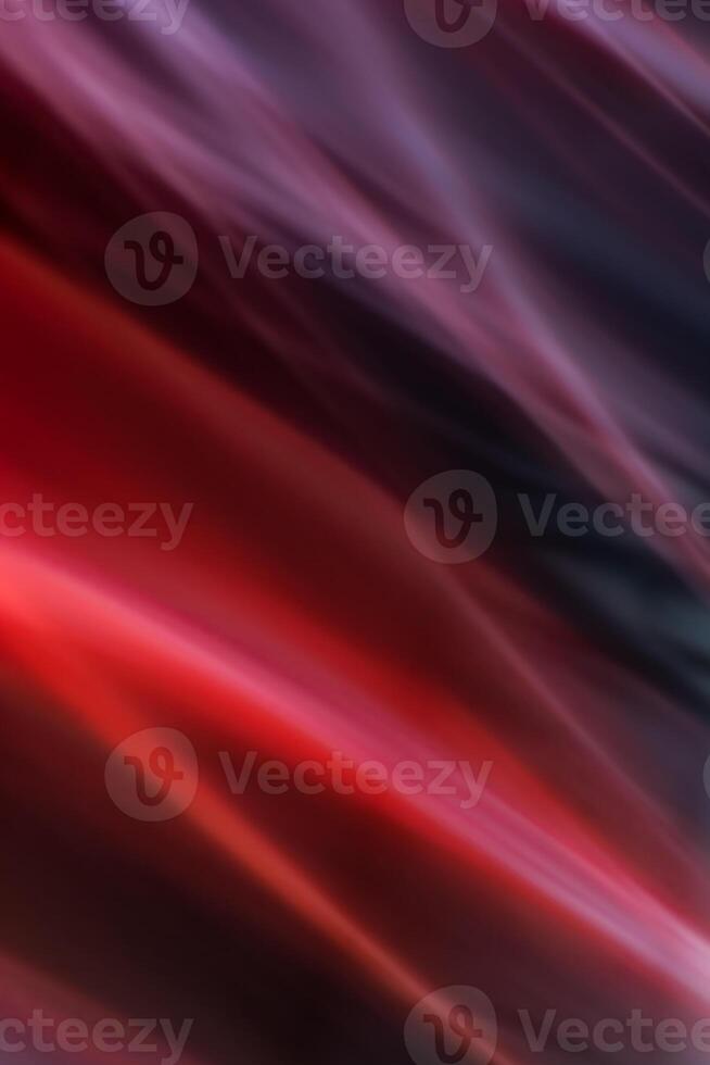 Abstract vertical red background with diagonal smooth lines waves. Light and rays are blurred in motion. photo