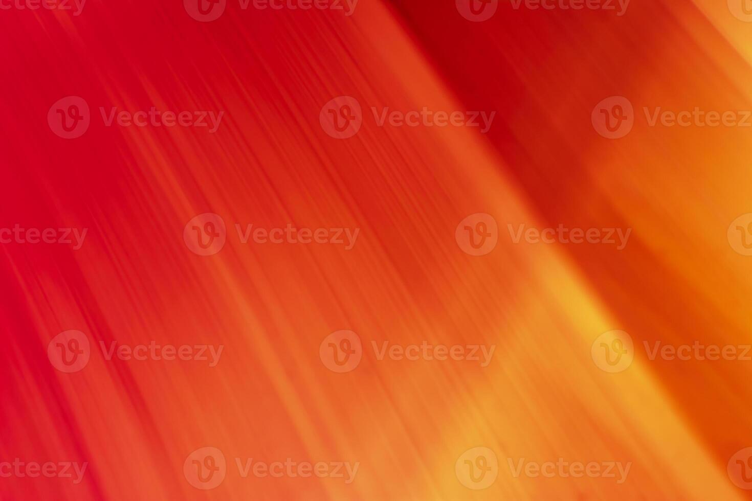 Bright colored blurry strokes and waves in the form of red and orange lines. Abstract background. Place for copy space. photo