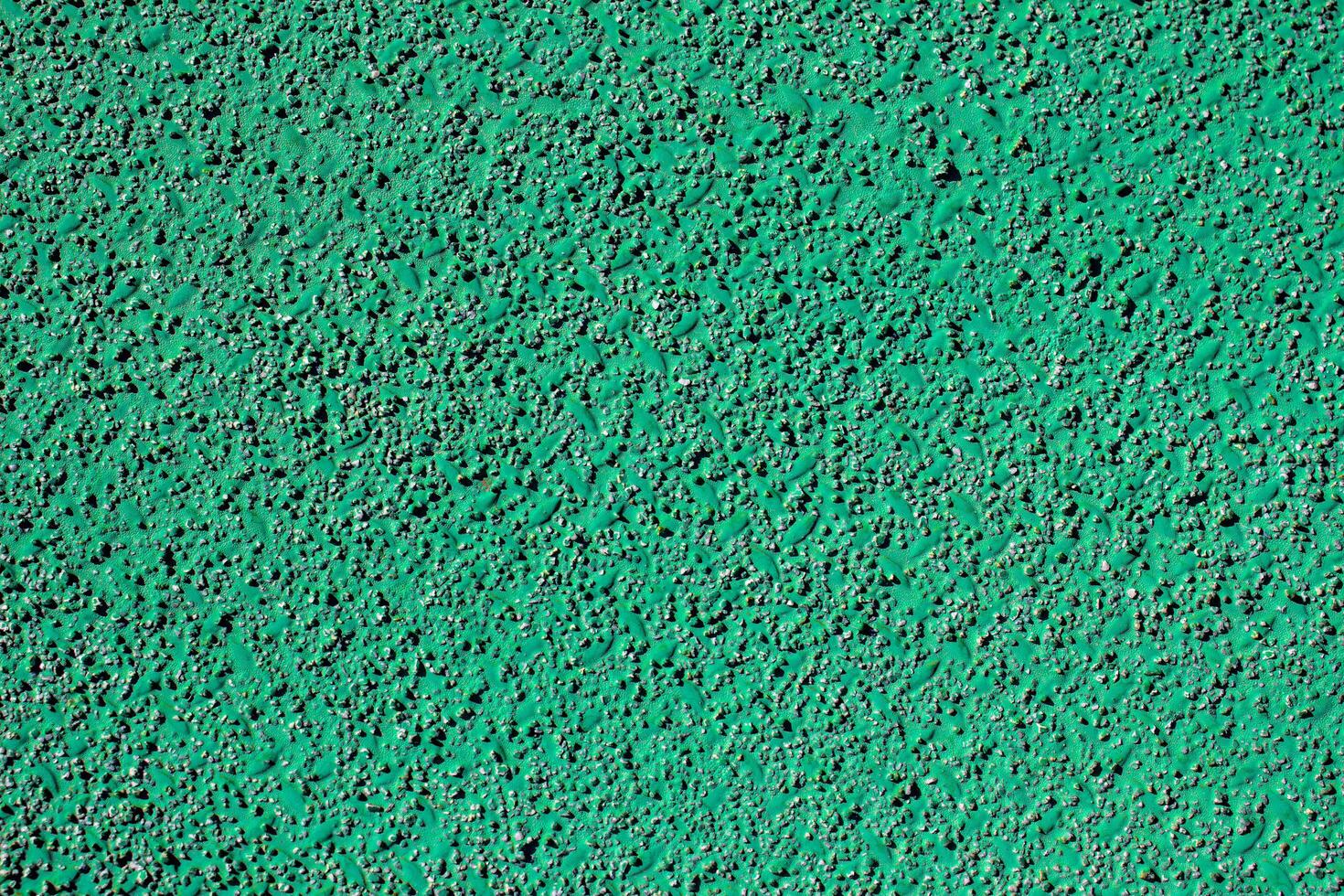 Green sandy floor and non slip paint for background and texture photo