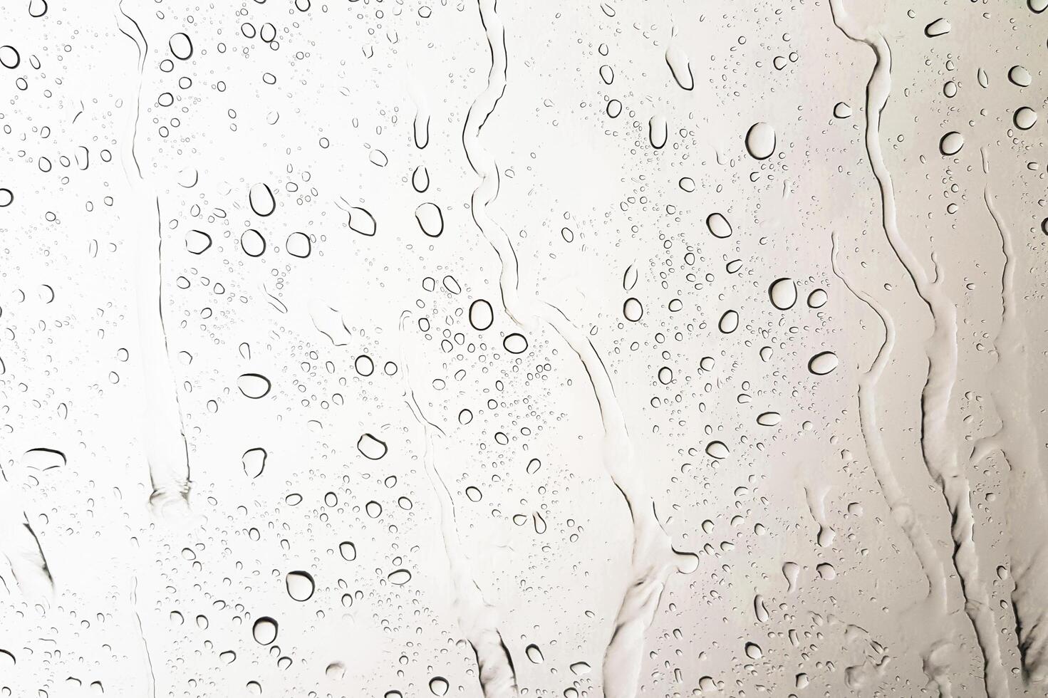 lluvia gotas en el vaso coche para textura y antecedentes foto