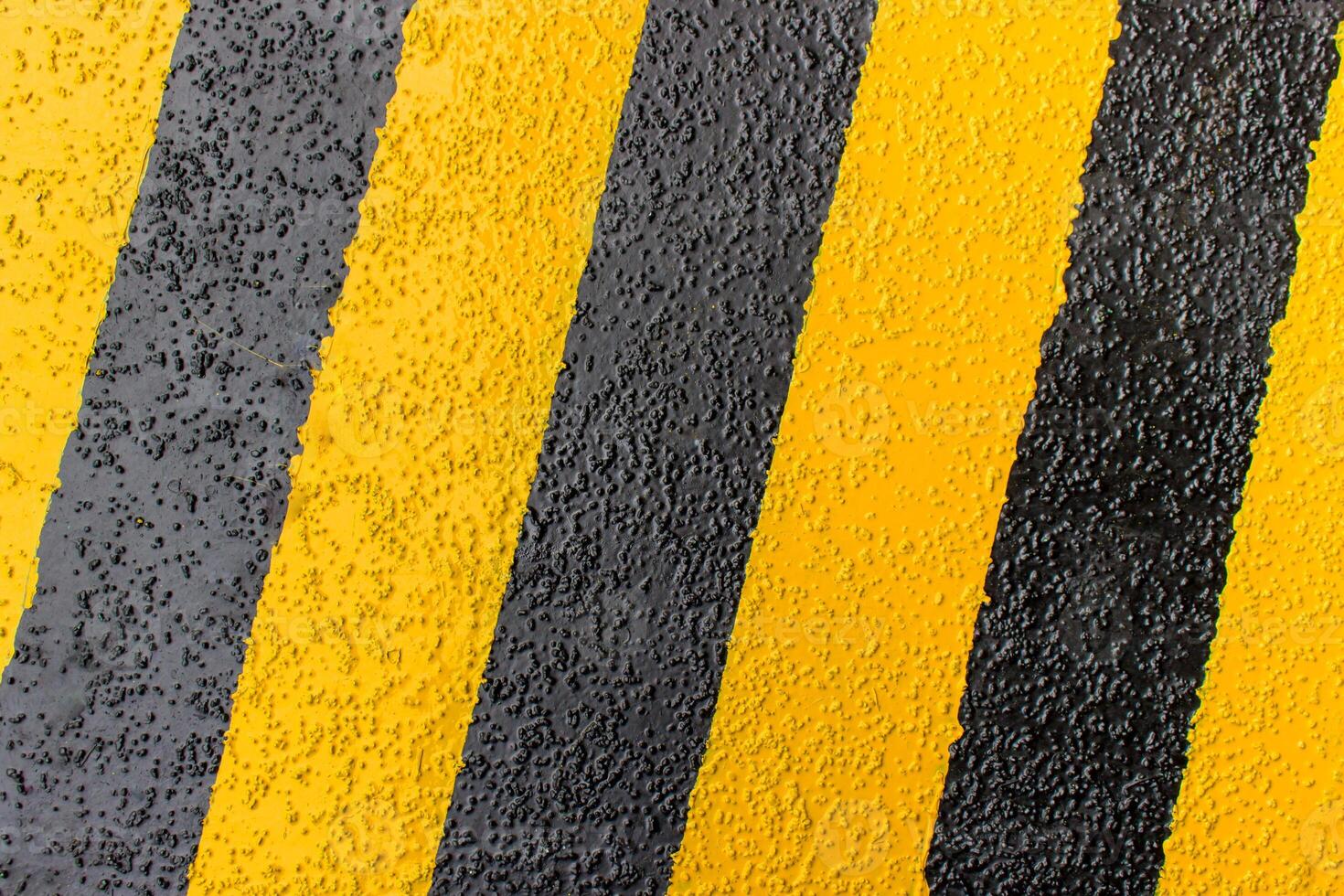 Symbol color of safety road on the non slip yellow and black mark on the floor industrial and factory concept photo