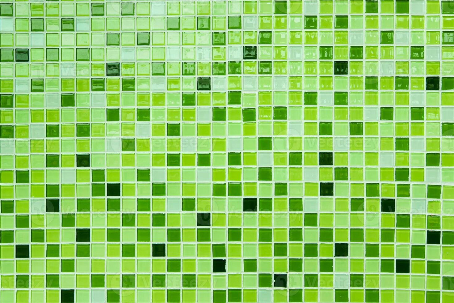Pared de azulejos de cerámica de patrón de luz verde para el fondo y diseño interior usado foto