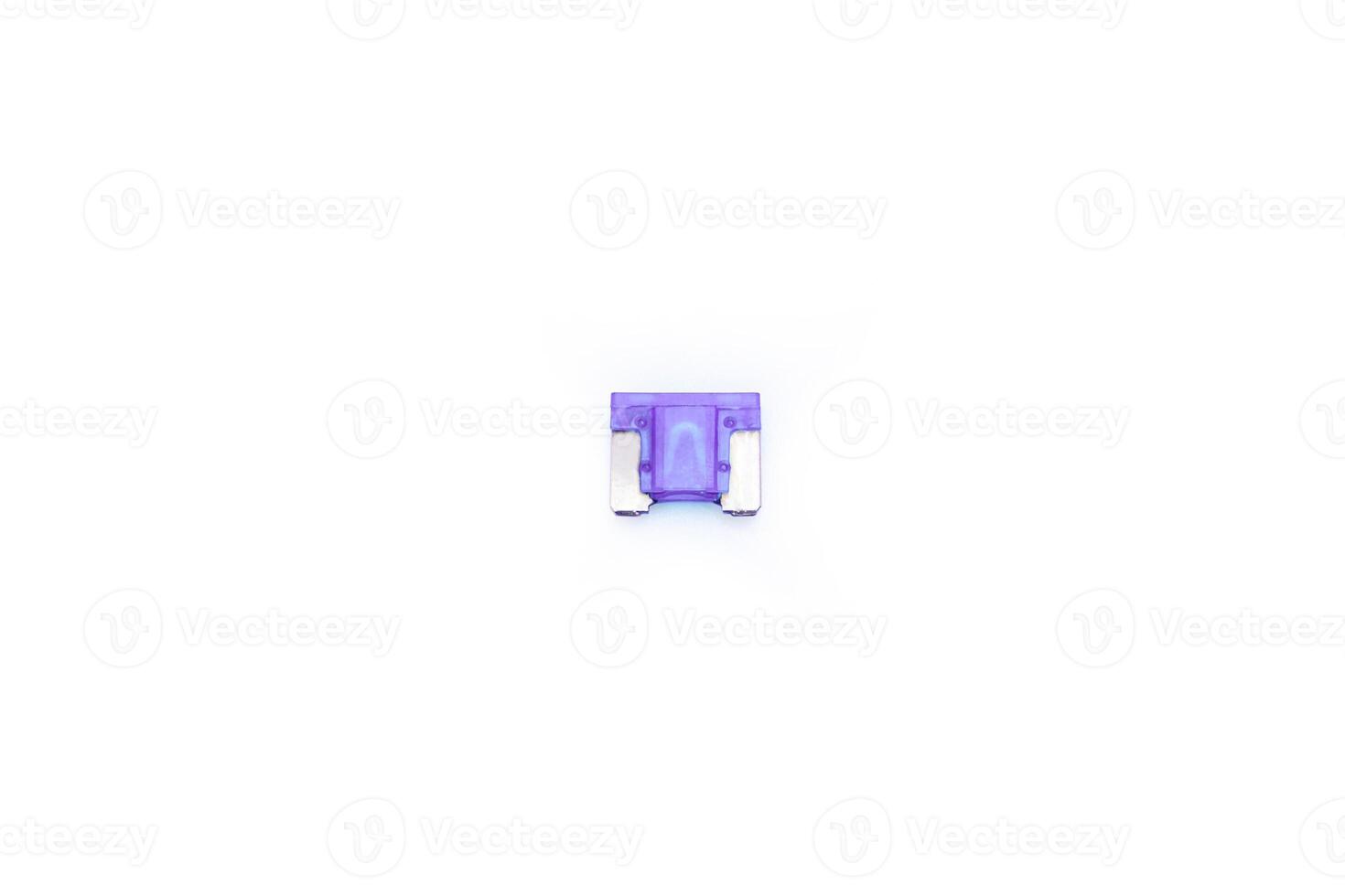 Old Car fuse  purple color on white background micro size use for protection in electric system of car photo