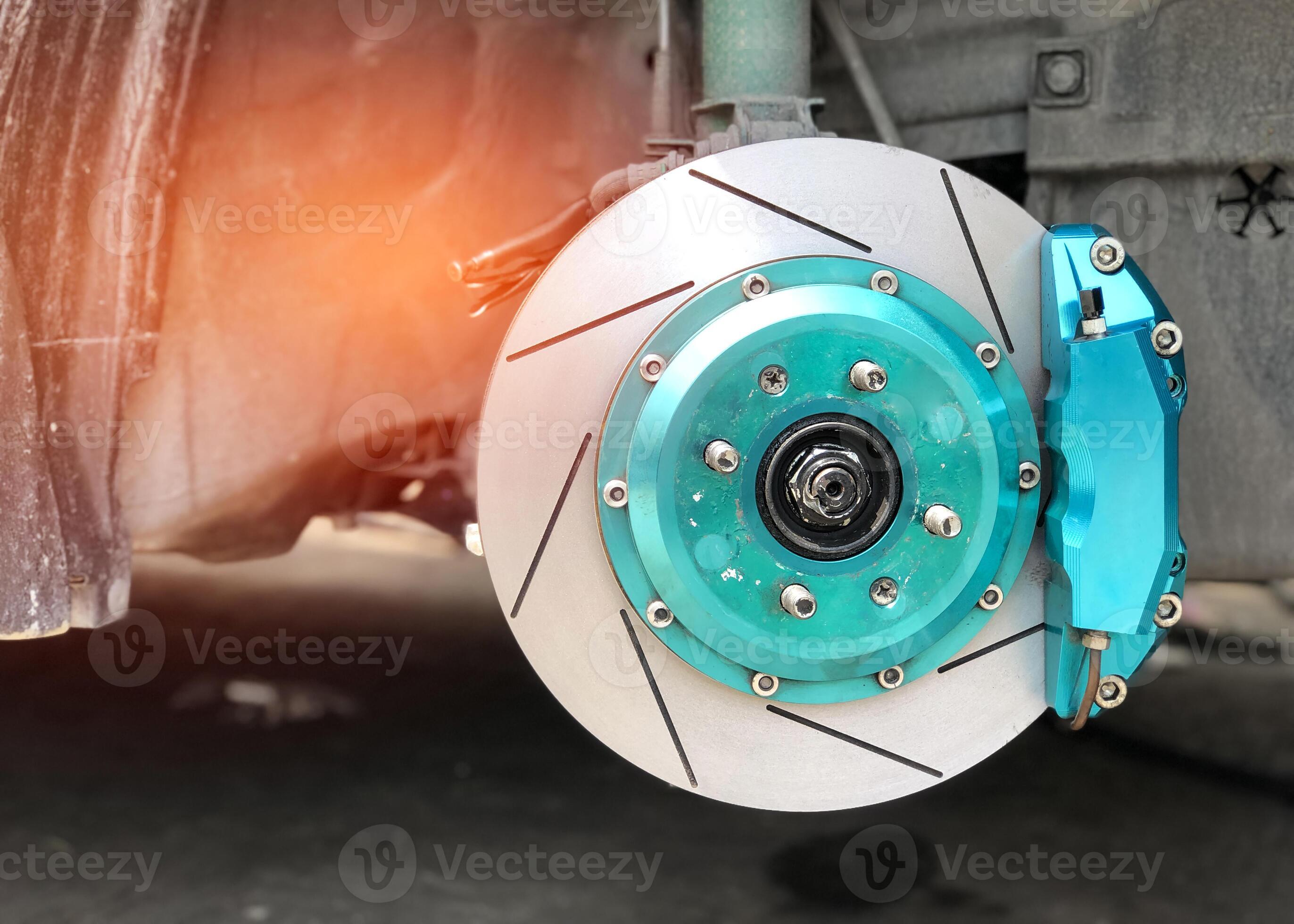 Close up brake disk caliper and cylinder of caliper for car check