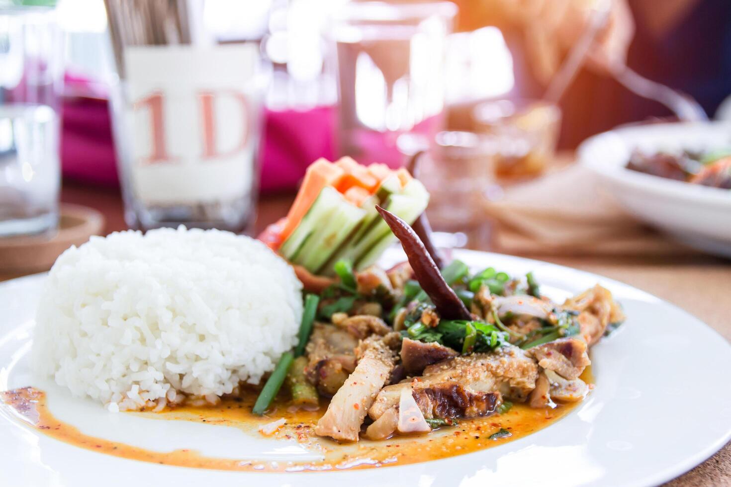 Close up Laab Pork and  cooked rice on the table in restaurant food concept Northeastern food in Thailand photo