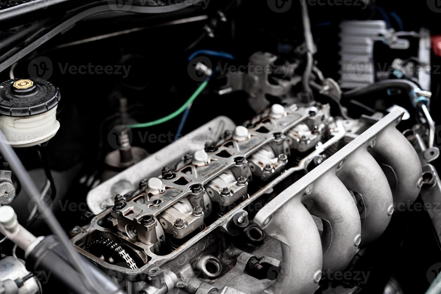 Close up valve system of car engine maintenance and service concept of in side engine photo
