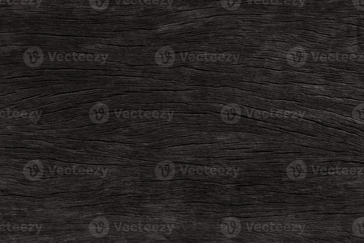 Dark brown wood and uneven surfaces for texture and copy space in background photo