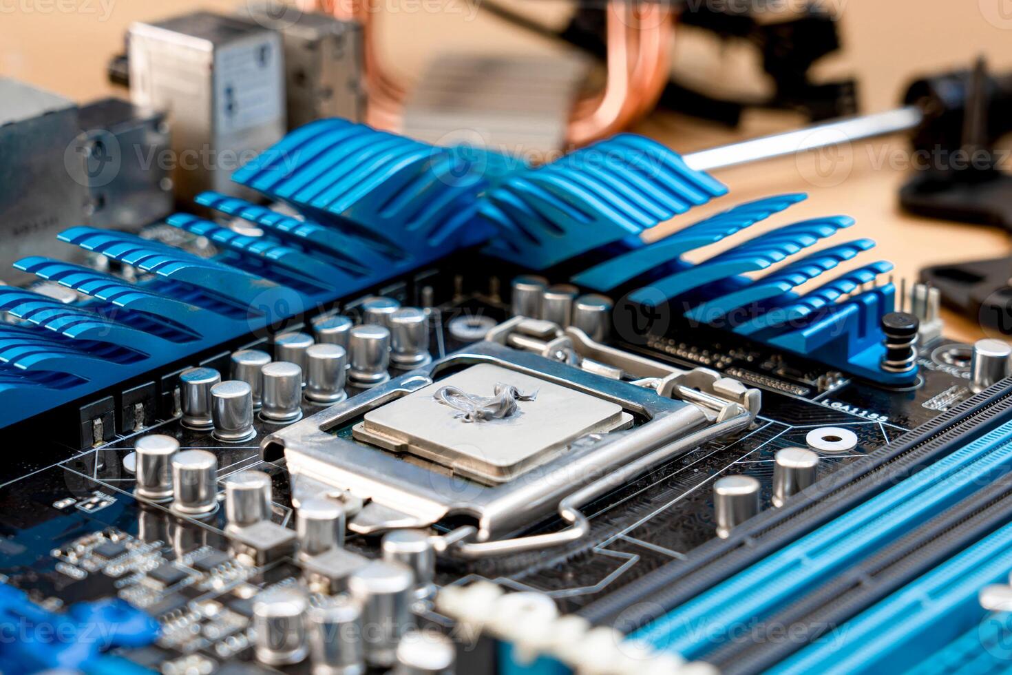 Thermal grease or thermal compound to a CPU new change for performance ,repair concept of desktop computer photo