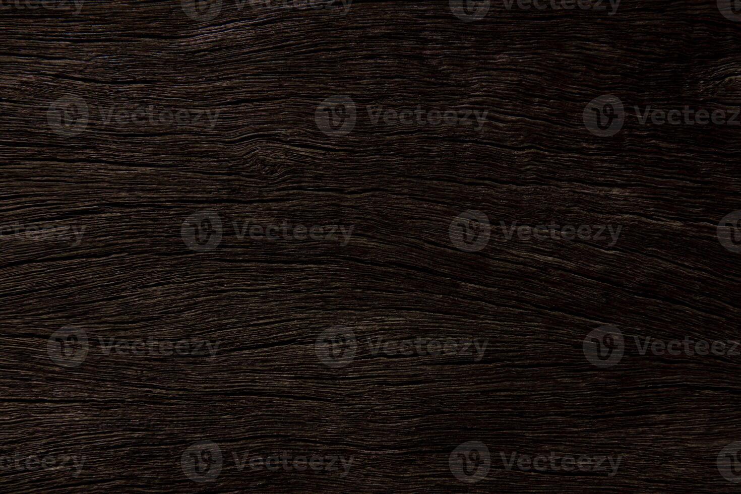 Dark brown wood with a rough surface  for texture and background photo