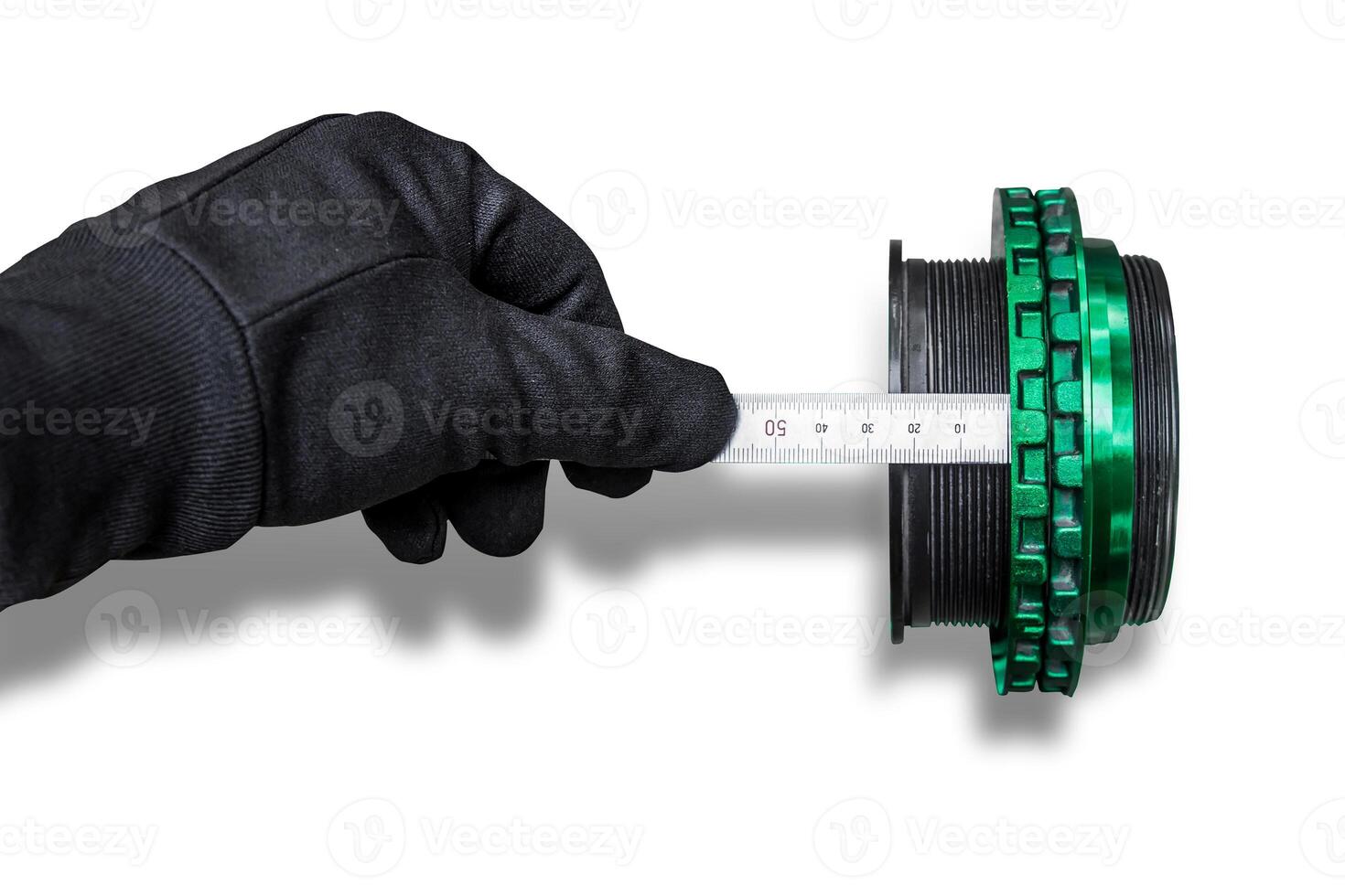 Action concept Hand a man use steel ruler check and adjust level screw of chock absorber spring on white background and texture photo