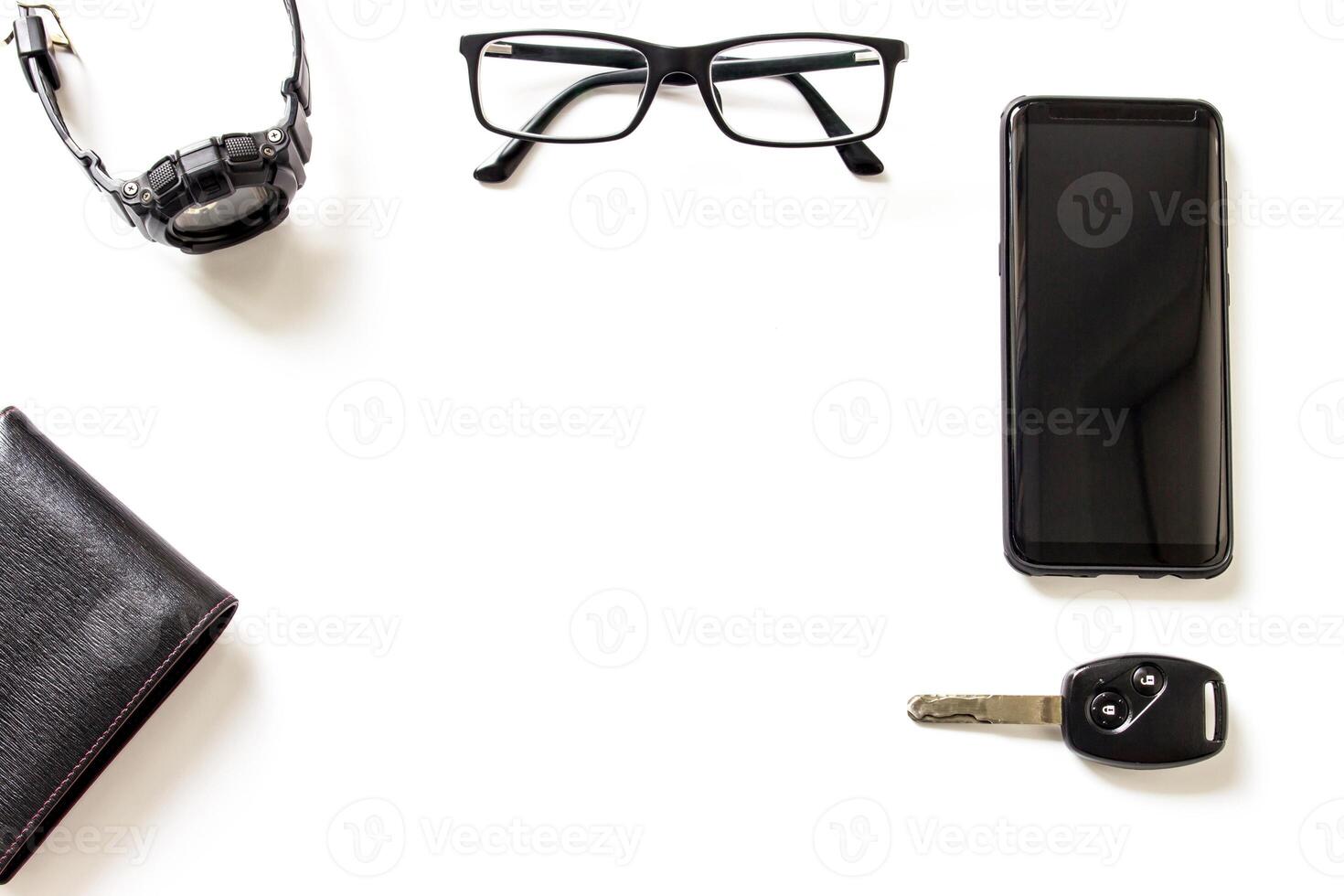 Glasses smart phone car key Watch wallet on the white background floor Holiday concept Travel Accessories and space for texture photo