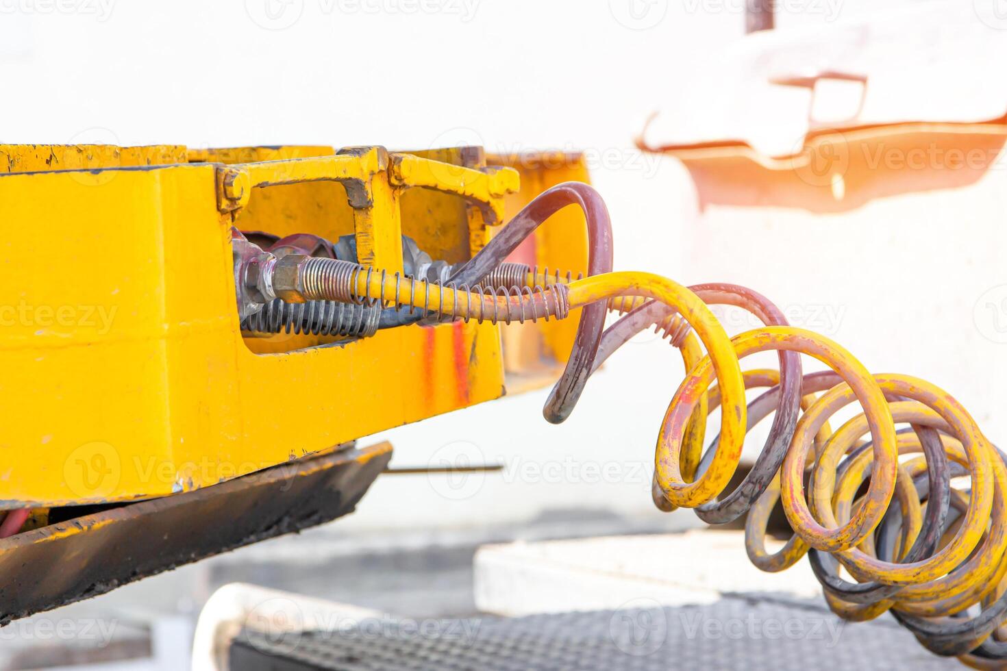 Close up Air joint and valve of air supply brake system with truck in factory background photo