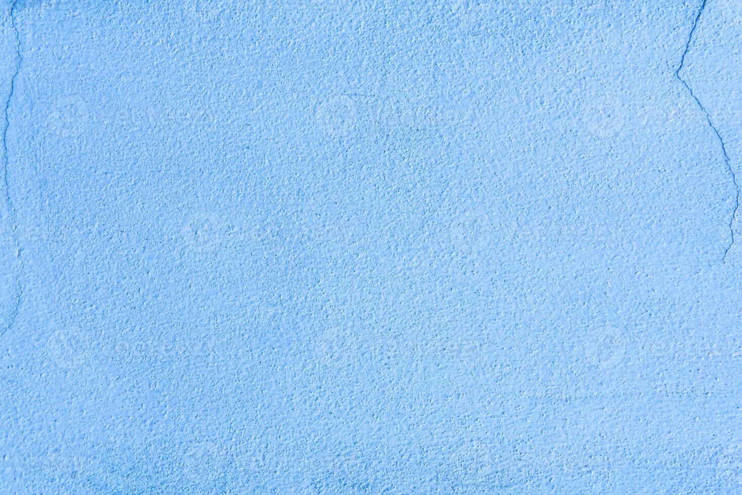 Light blue pastel colors with crack on surface for background and texture photo