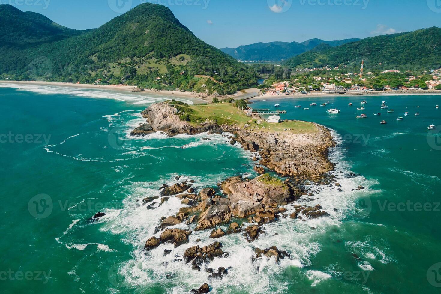 Ocean Coastline, beach and ocean with waves in Brazil. Aerial view of Ponta das Campanhas photo