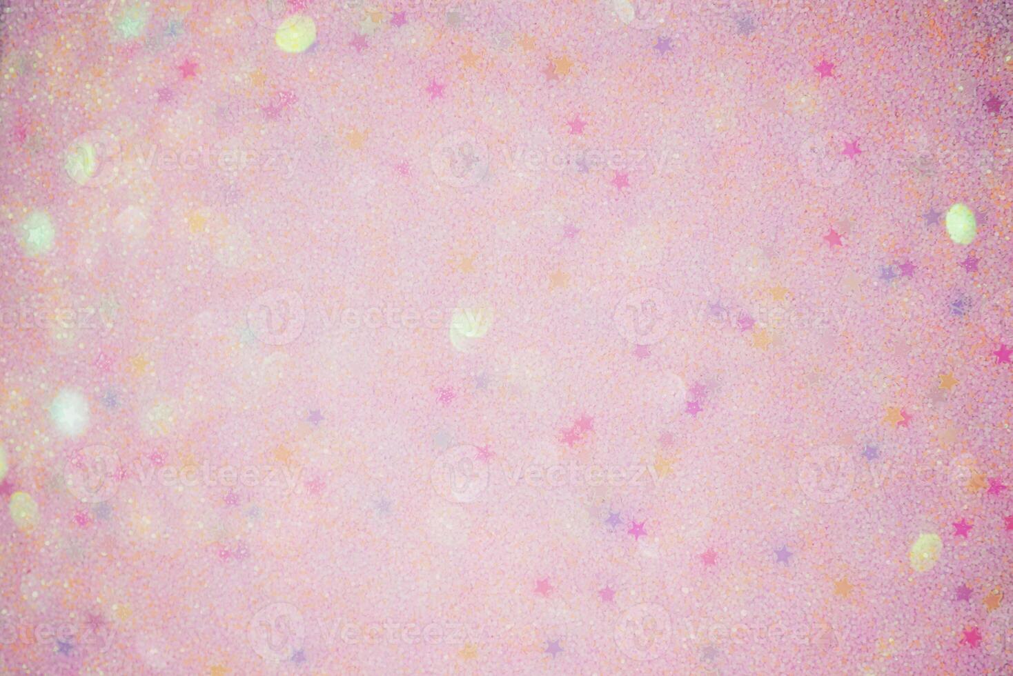 Pink defocus background with glitter stars and defocus lights. Pink glitter paper in defocus. photo