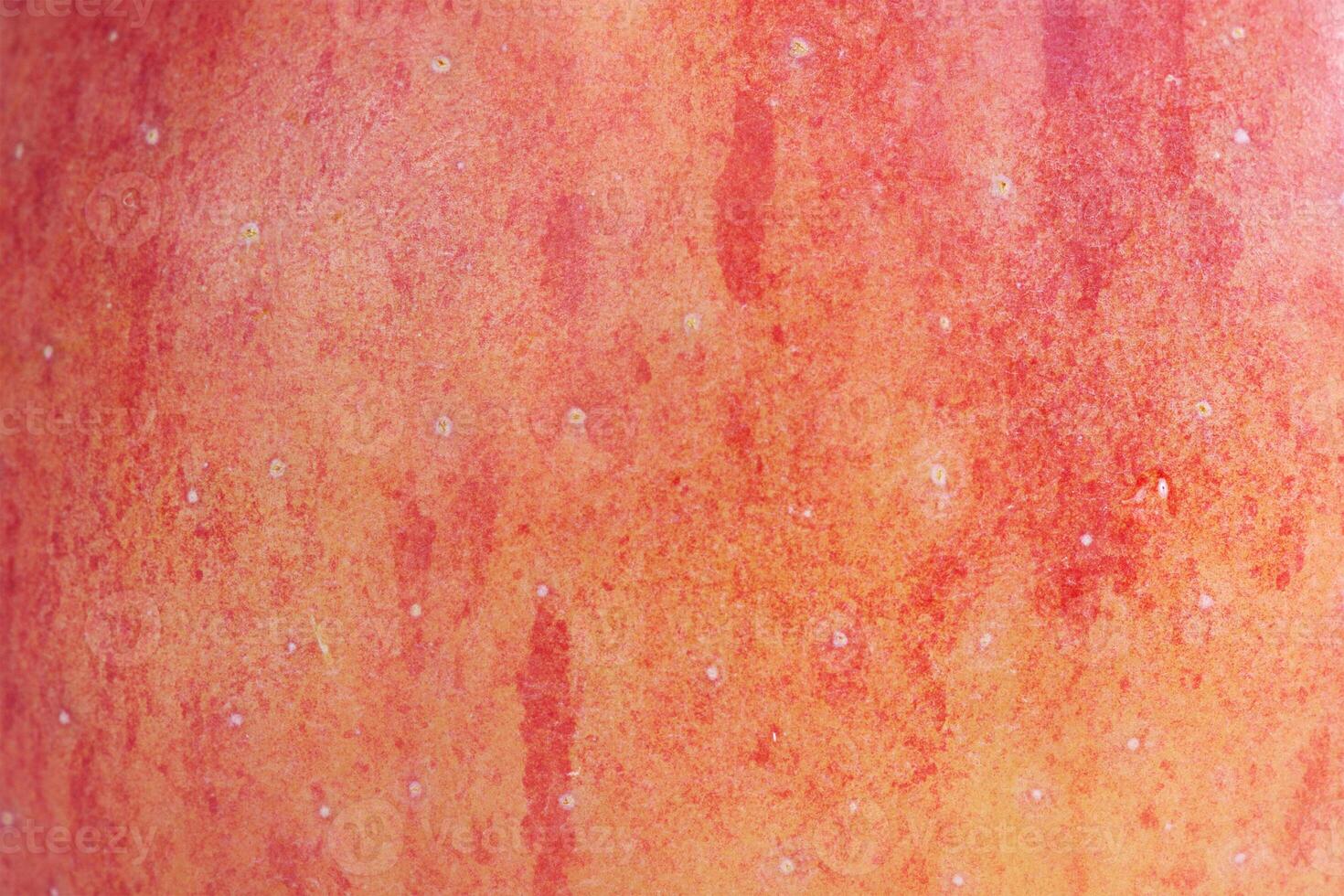 The texture of a delicious fresh apple as a background. Apple as a material for a designer. photo