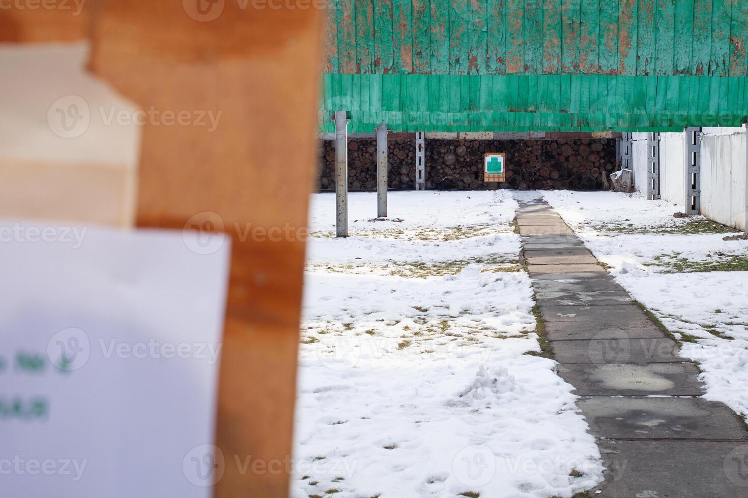 Paper target in the dash, hanging. Winter, firearms, gunfire photo