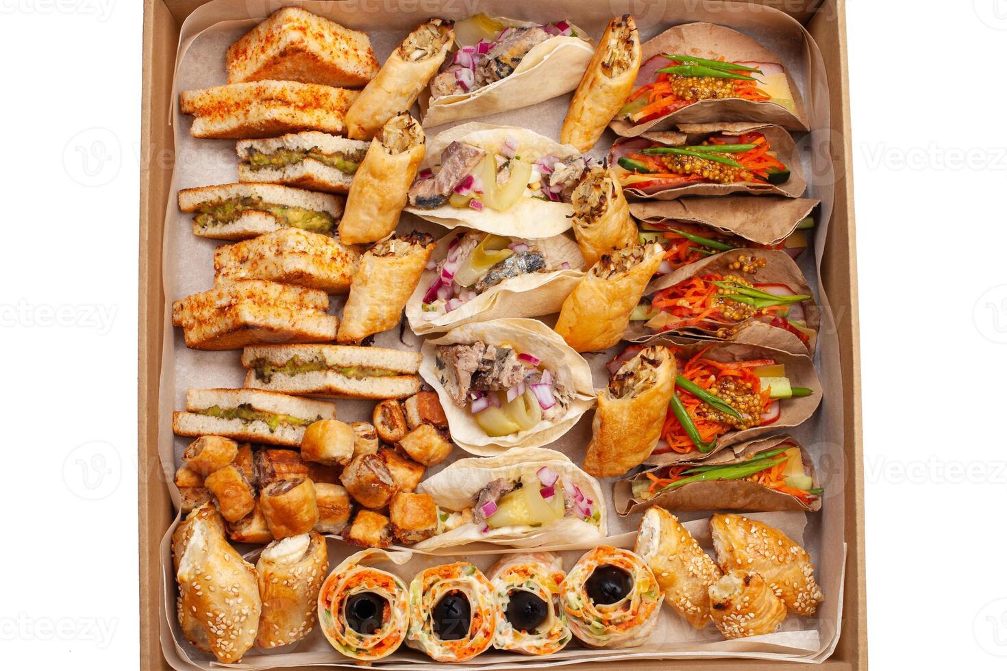 Boxing with food, cardboard box with snacks, home delivery. Catering. Gift for any holiday. Ready family dinner, party food. photo