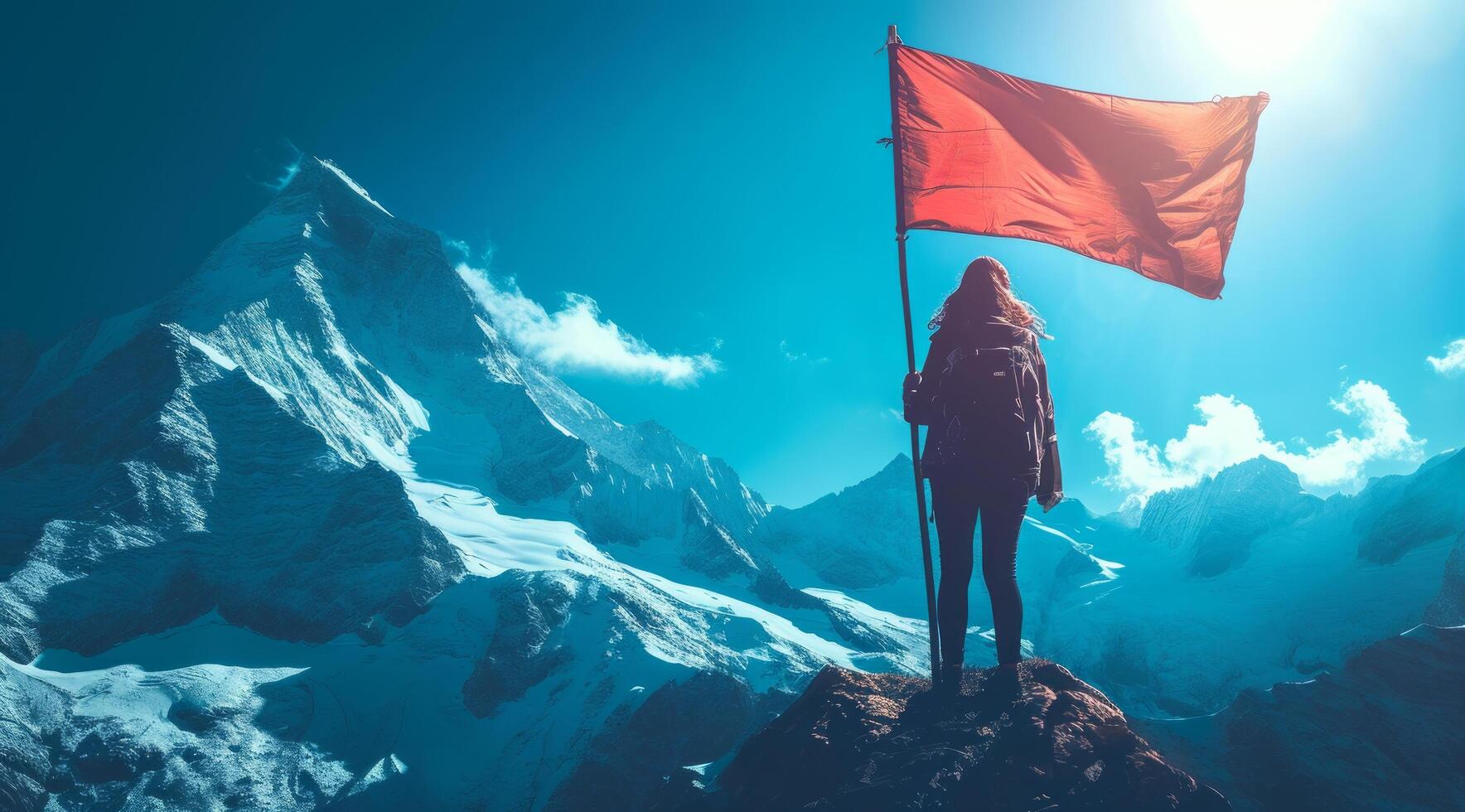 ai generado persona participación un fem bandera en parte superior montaña foto