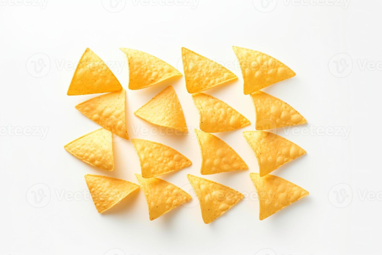 AI generated Corn chips of triangular shape levitate on a white background Generative AI photo