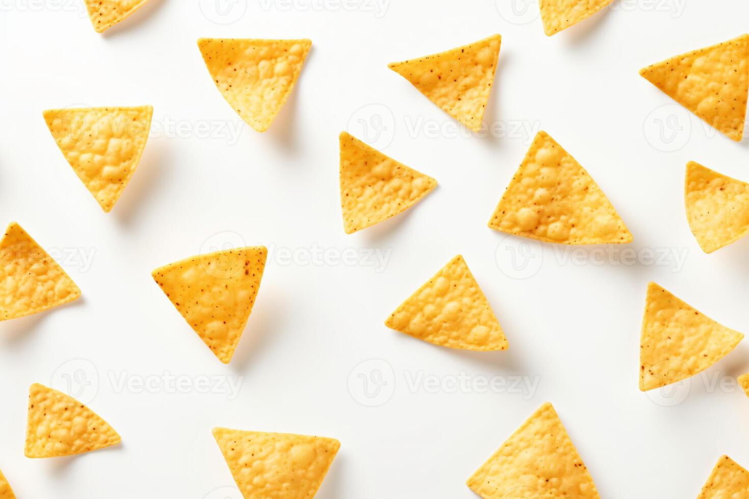 AI generated Corn chips of triangular shape levitate on a white background Generative AI photo