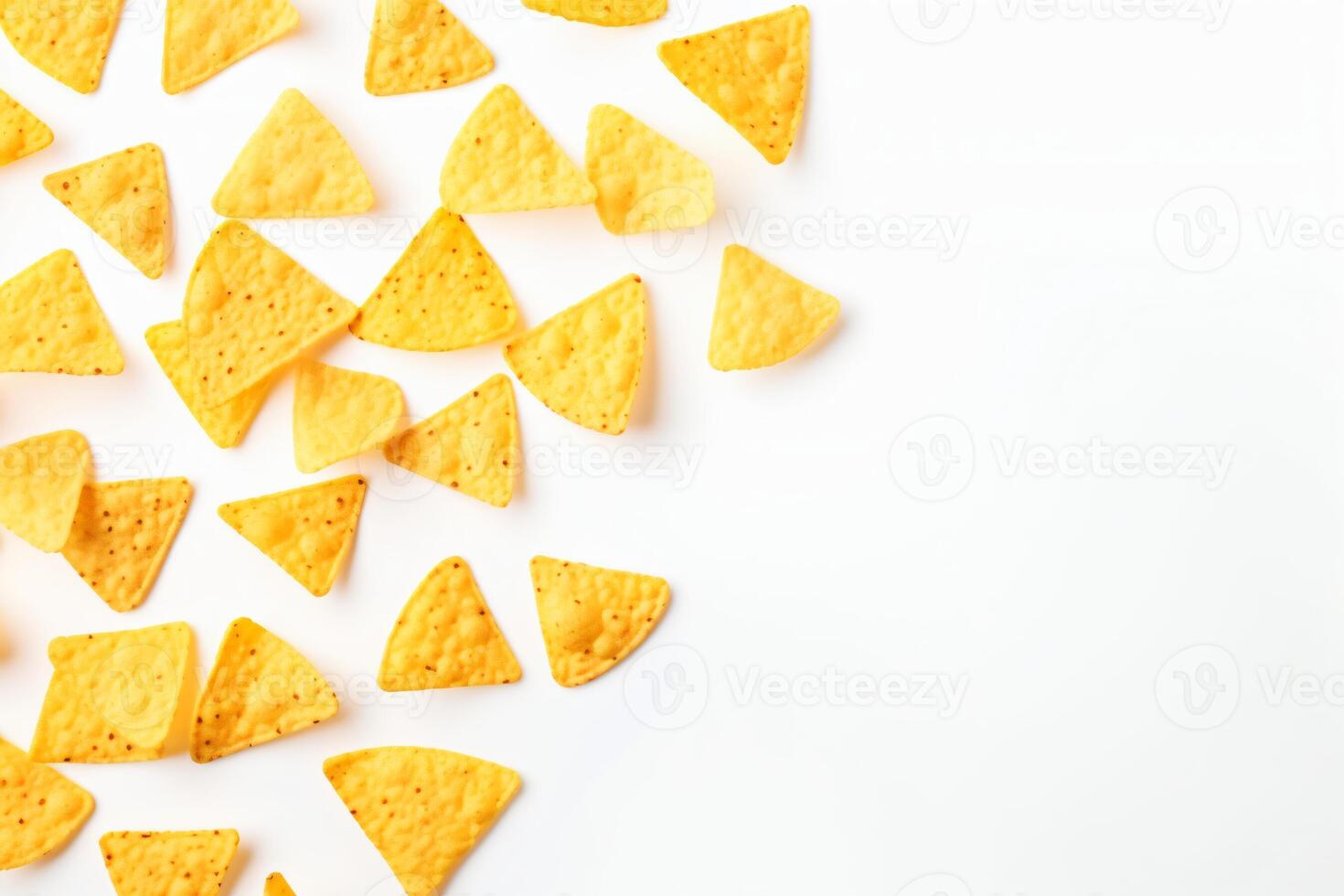 AI generated Corn chips of triangular shape levitate on a white background Generative AI photo