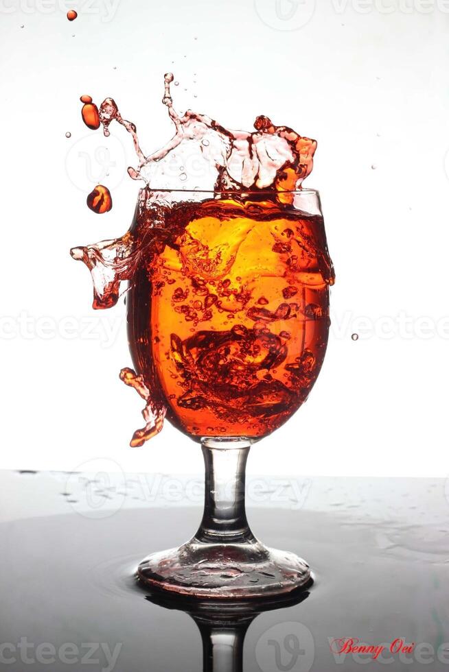 cheers water splash in wine glass photo