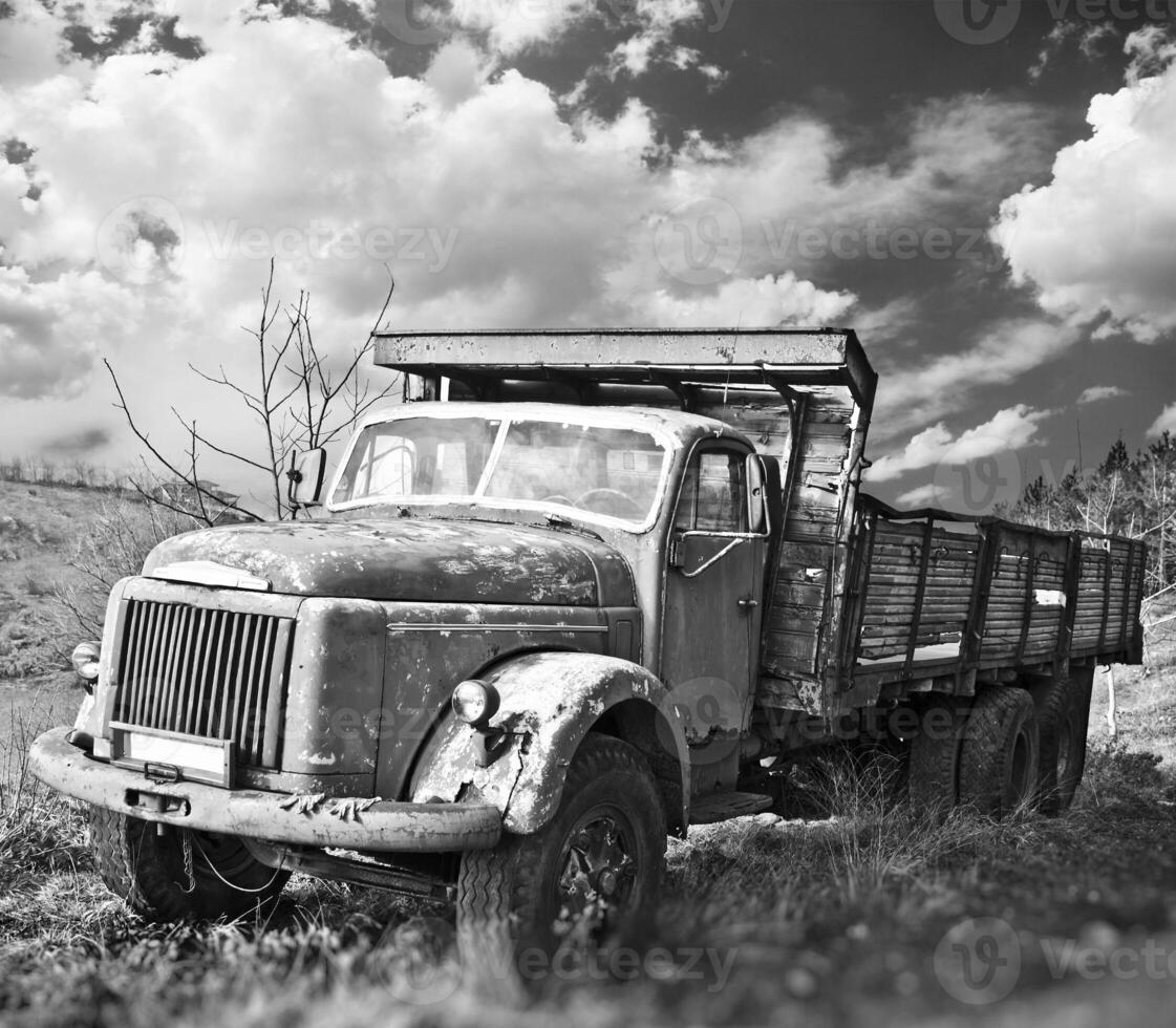 Old truck on field photo