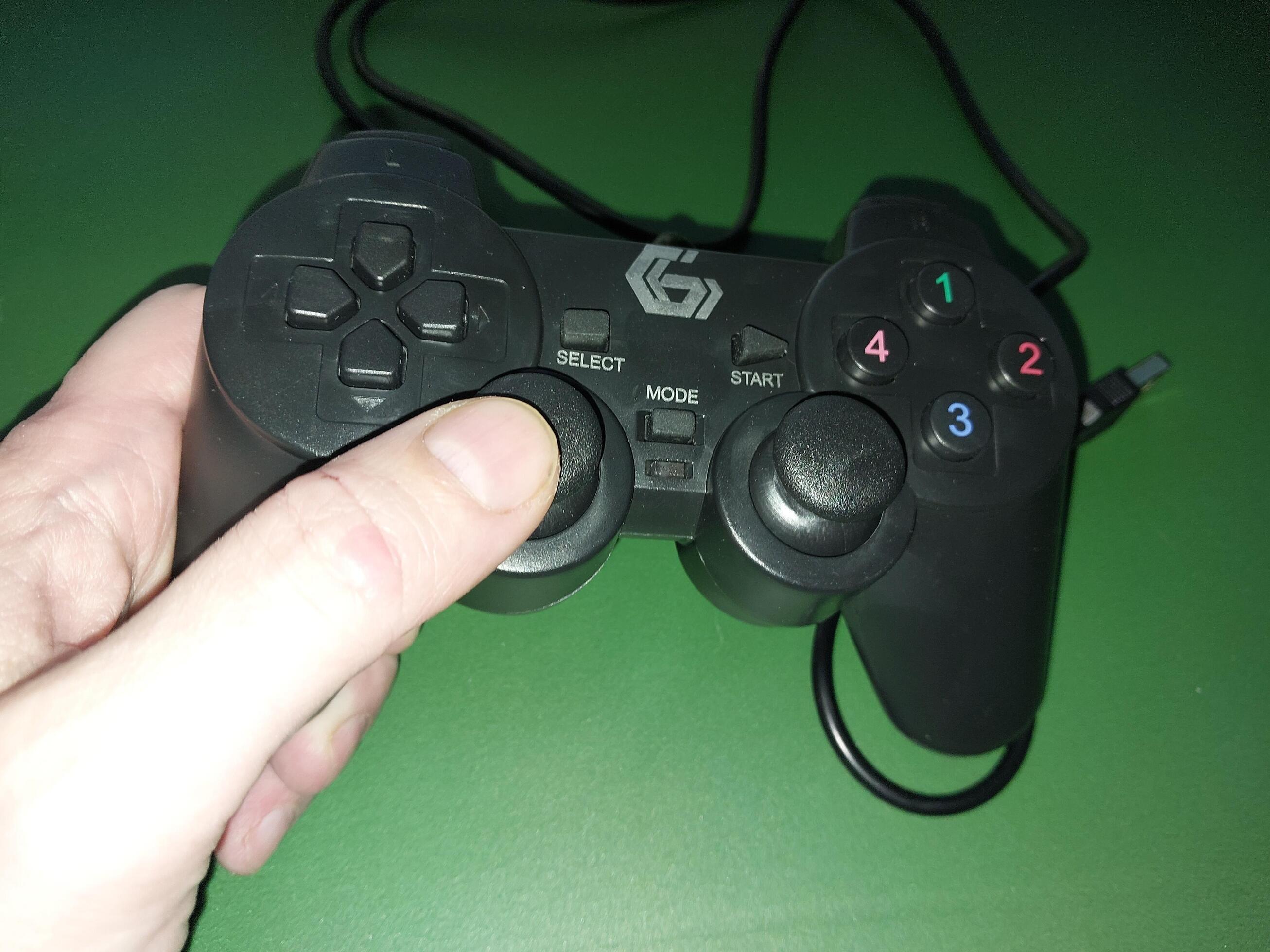 KYIV, UKRAINE December 26, 2023 Gamepad for playing computer games