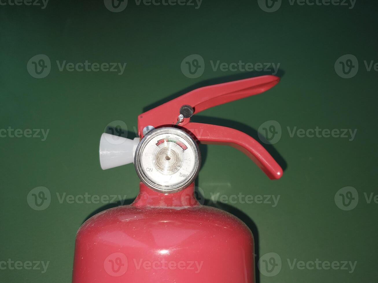 Manual powder fire extinguisher for extinguishing indoor fires photo