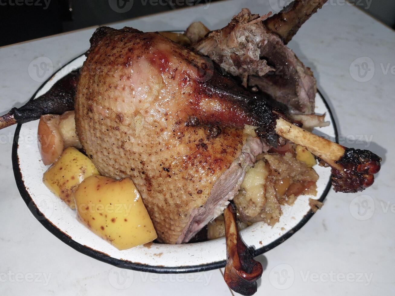 Goose bird baked in the oven for Christmas photo