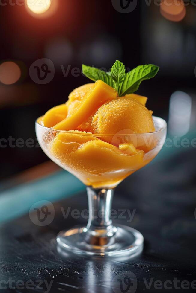 AI generated Mango sorbet in a glass on the table . Popsicle in a glass photo