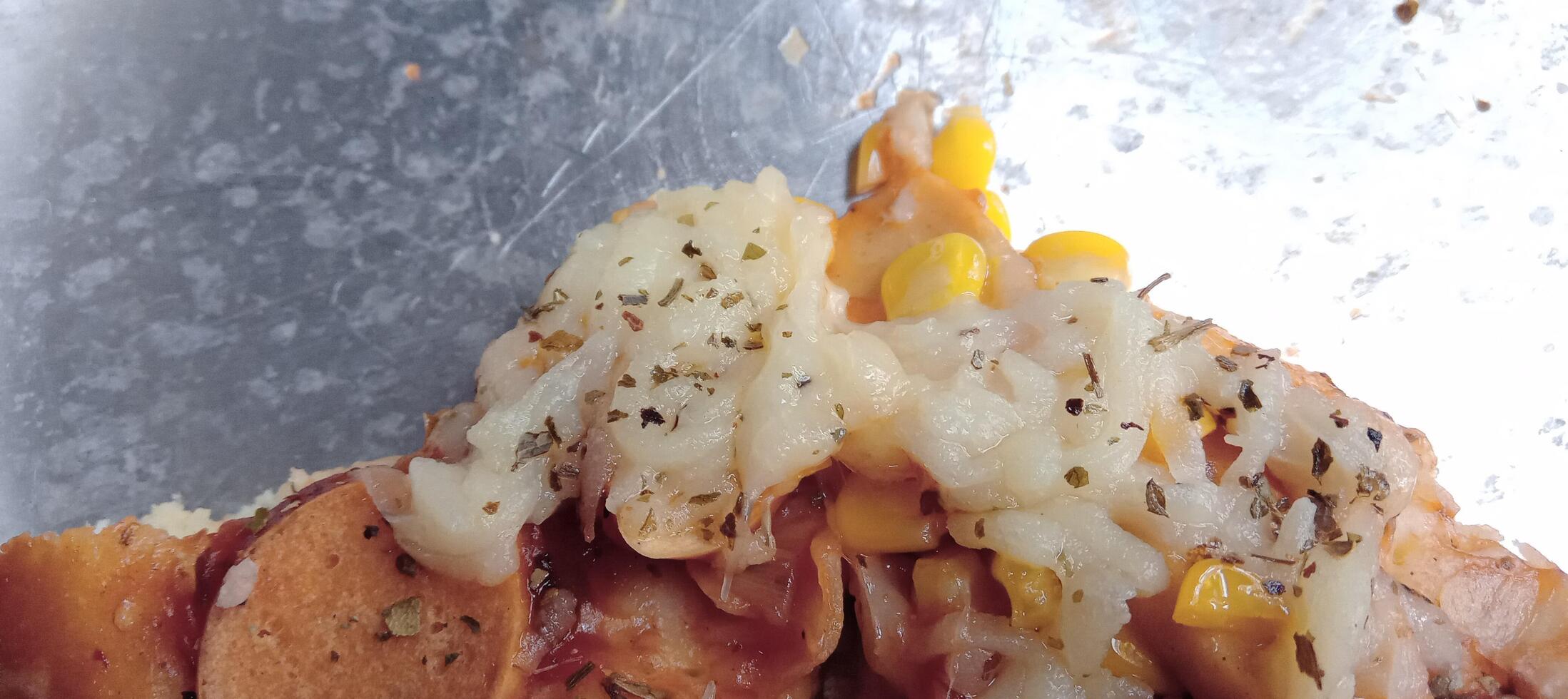 Corn pizza with cheese and sausage photo