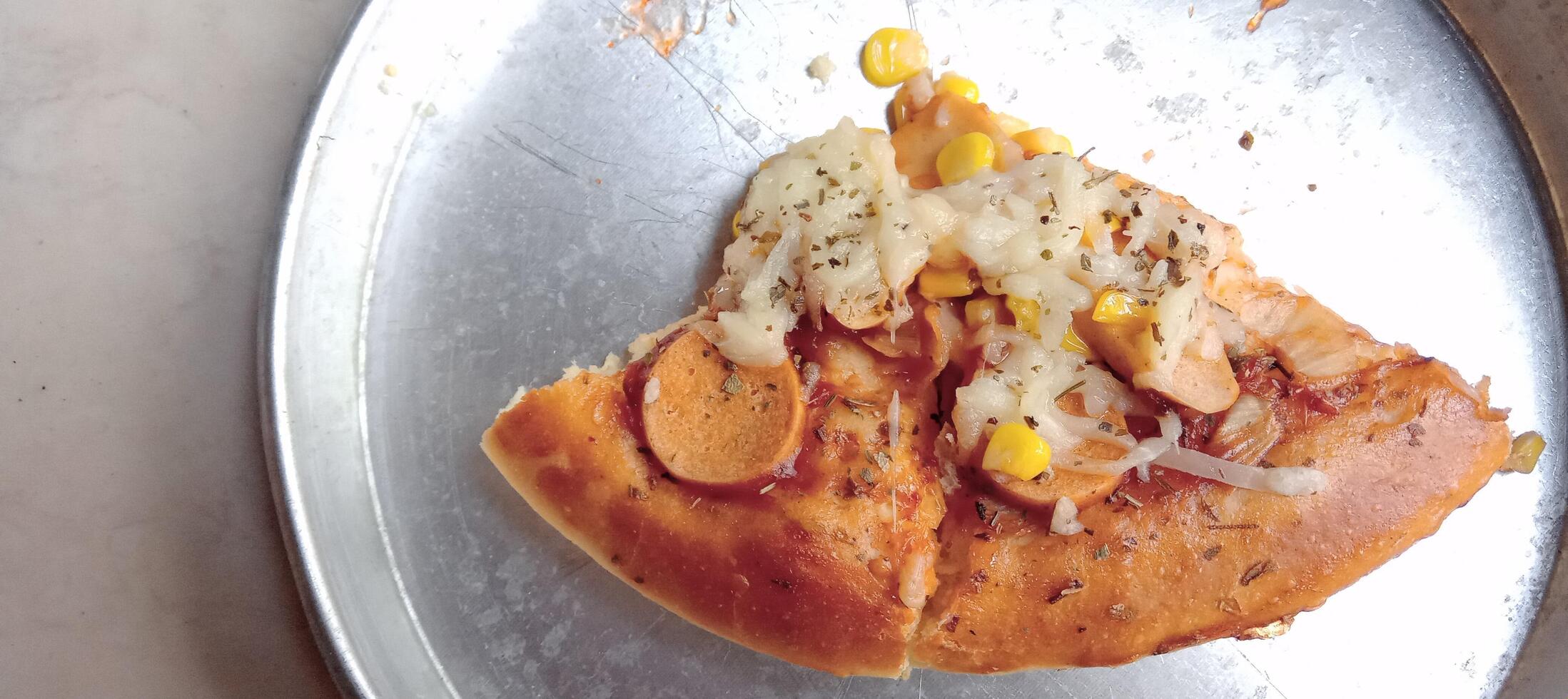 Corn pizza with cheese and sausage photo