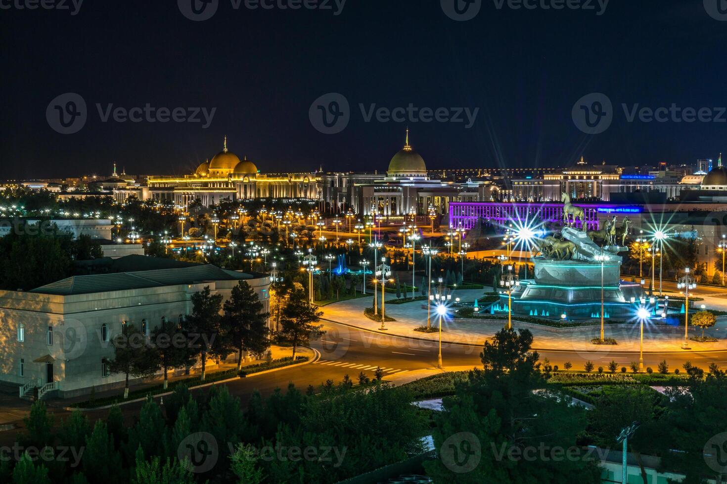 Night view of the presidential palace, Oguzhan, in Ashgabat Turkmenistan photo