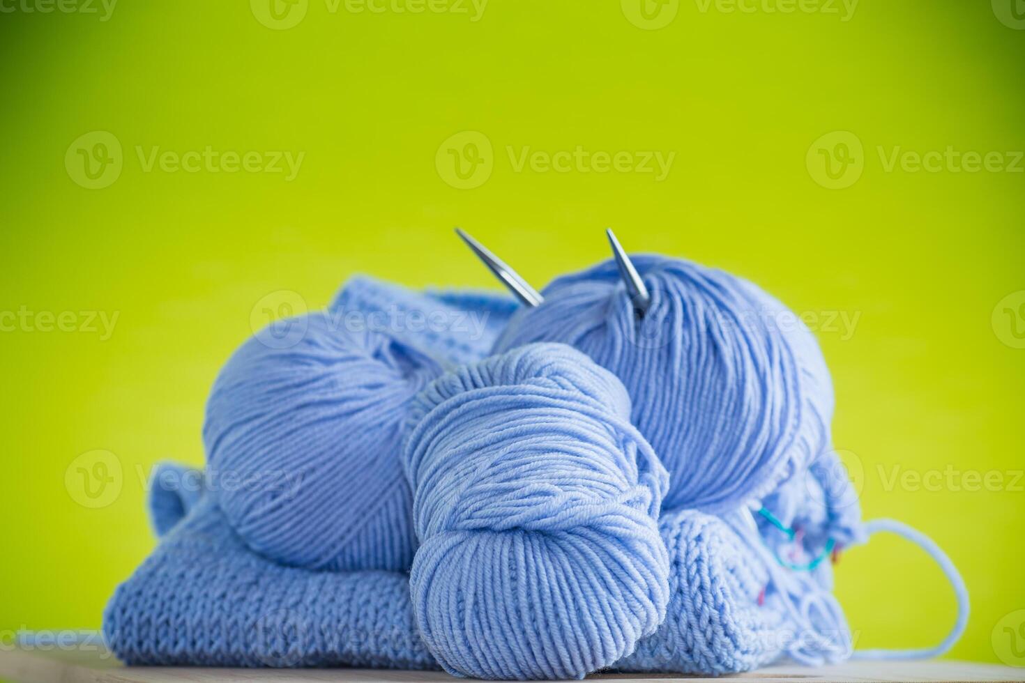 Set for hand knitting, blue yarn, knitting needles. photo