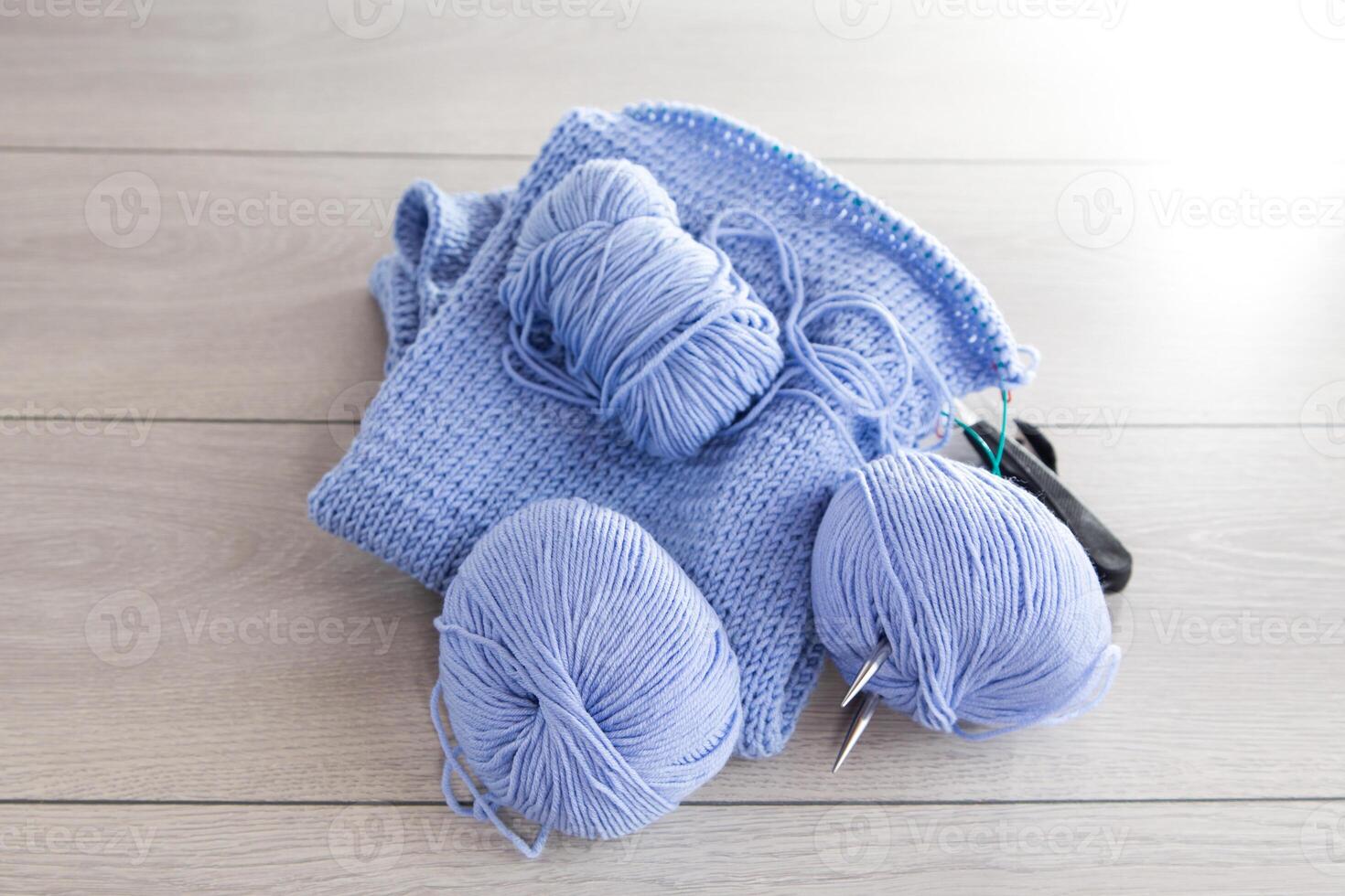 Set for hand knitting, blue yarn, knitting needles. photo