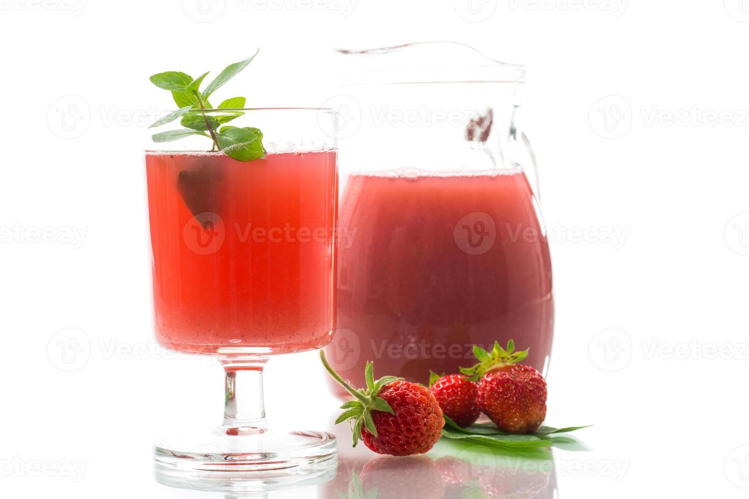 Cold summer strawberry kvass with mint in a glass photo
